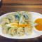 Spl Veg Steamed Momos (8 Pcs)