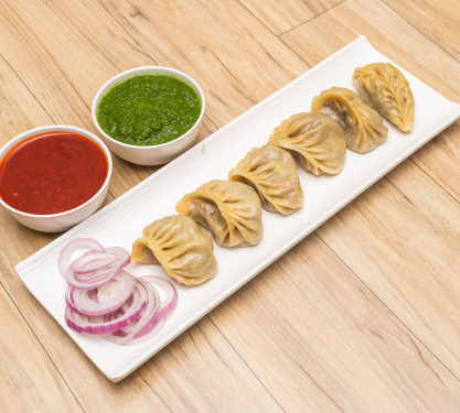 Spl Chicken Steamed Momos (8 Pcs)