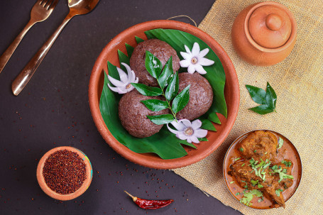 Ragi Mudha With Chicken Pulusu