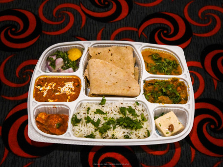 Silver Punjabi Thali (1 Paneer Sabji 1 Veg.sabji 4 Butter Roti Dal Fry Jeera Rice Sweet Salad Mukhwas)