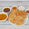 Aaloo Poori Aaloo Sabji, Chole, Kaddu, Raita And 4 Pooris